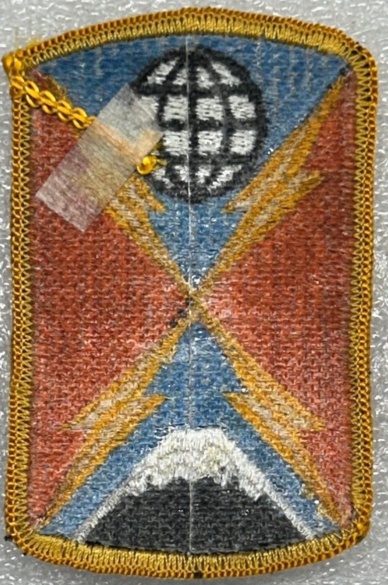 US Army 1104th Signal Brigade SSI/Patch Color Merrowed Edge - Bateleur Militaria