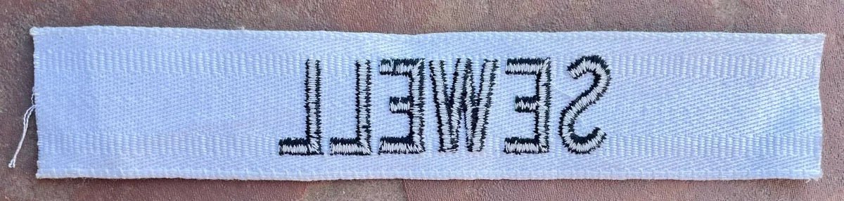 Vintage US Army Name Tape Black on White "Sewell" - Bateleur Militaria