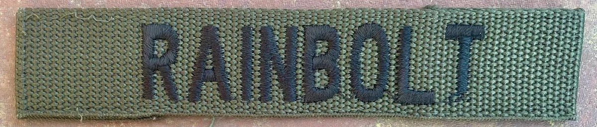 Vintage US Army Name Tape OD "Rainbolt" - Bateleur Militaria