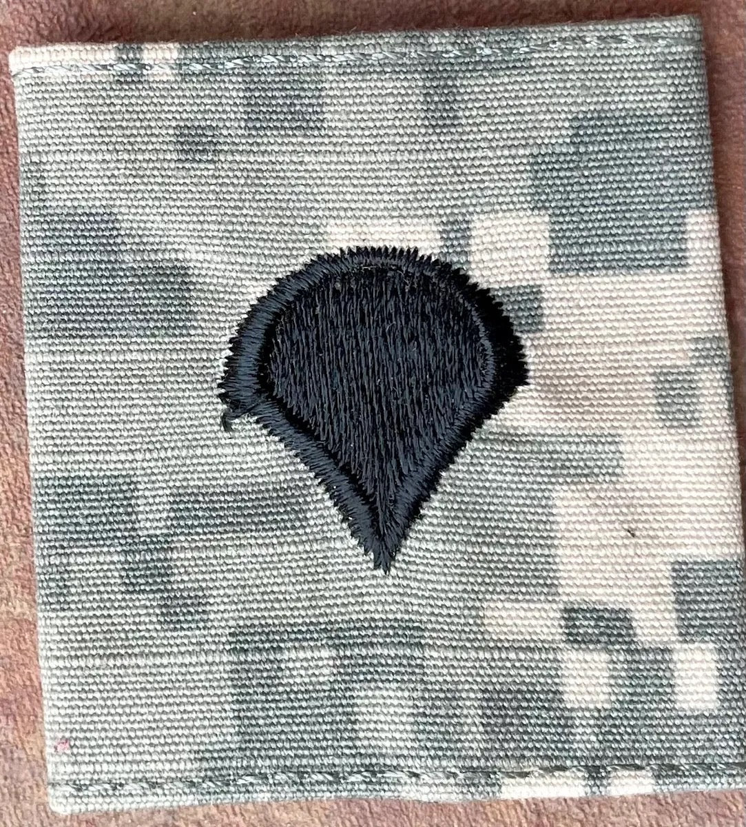 US Army Specialist Chevron on ACU Slide Single