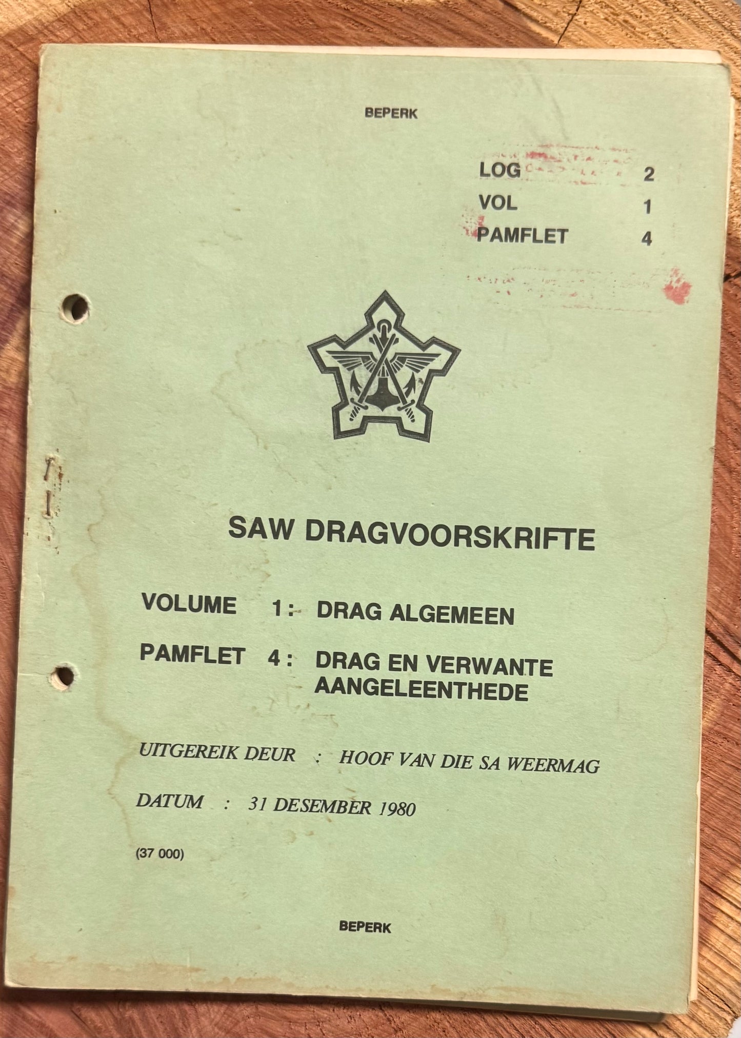 Green document with text and a logo on a wooden surface