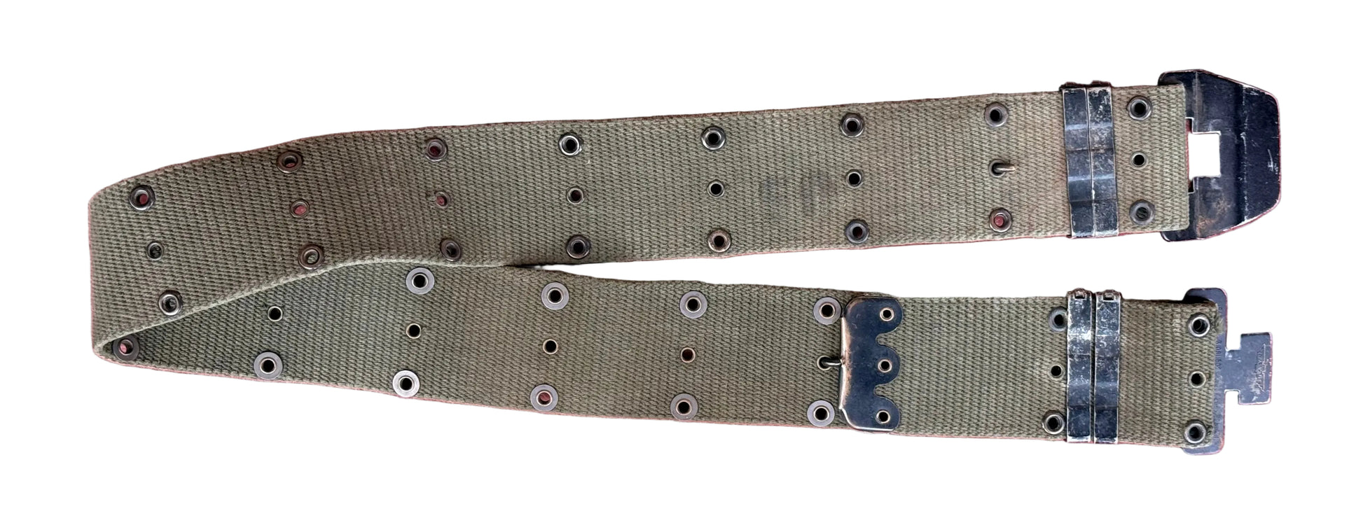 A vintage olive green canvas watch strap with silver-toned metal eyelets and dark metal buckle hardware, laid flat on a textured red surface.