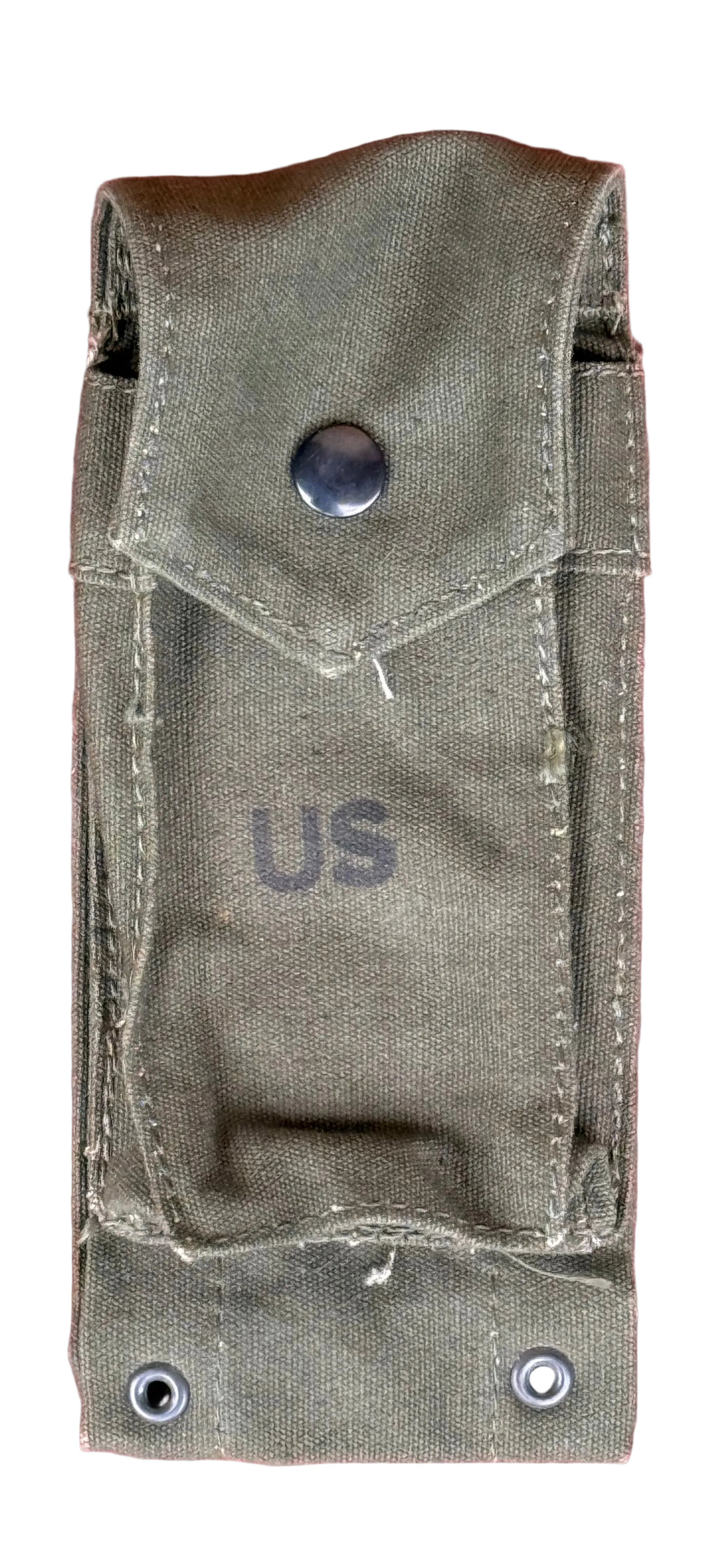 An olive drab canvas military pouch with a snap button closure and the letters 'US' printed on the front, shown against a textured pink background.