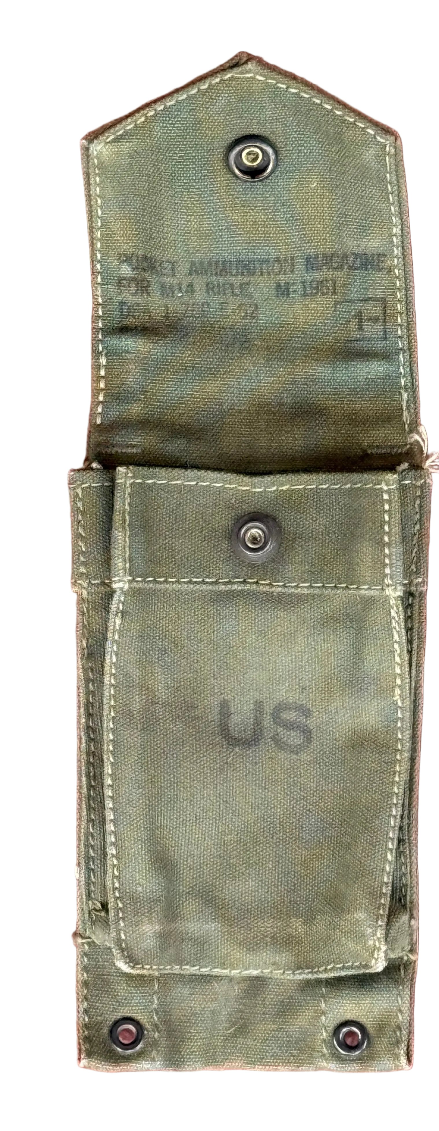 An olive drab canvas military pouch with metal snap closures, featuring stamped text on the top flap and 'US' printed on the front pocket, laid flat on a textured red surface.