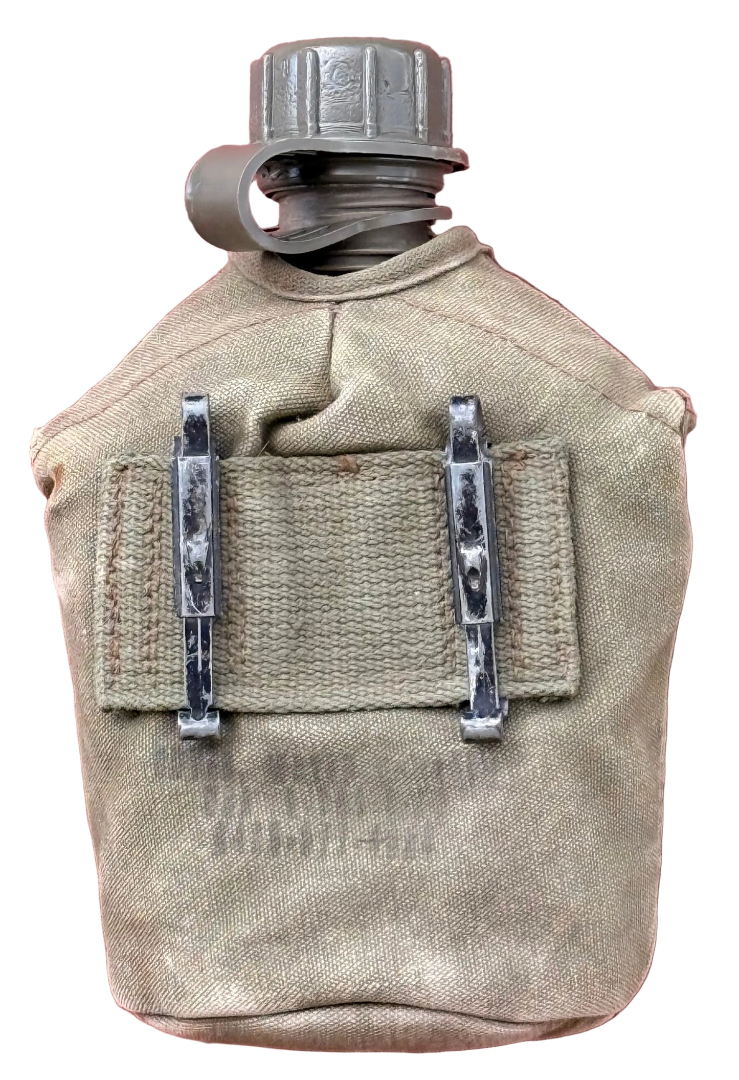 A vintage military canteen pouch in tan canvas with two silver metal clips and a gray plastic cap, shown against a textured red wall.