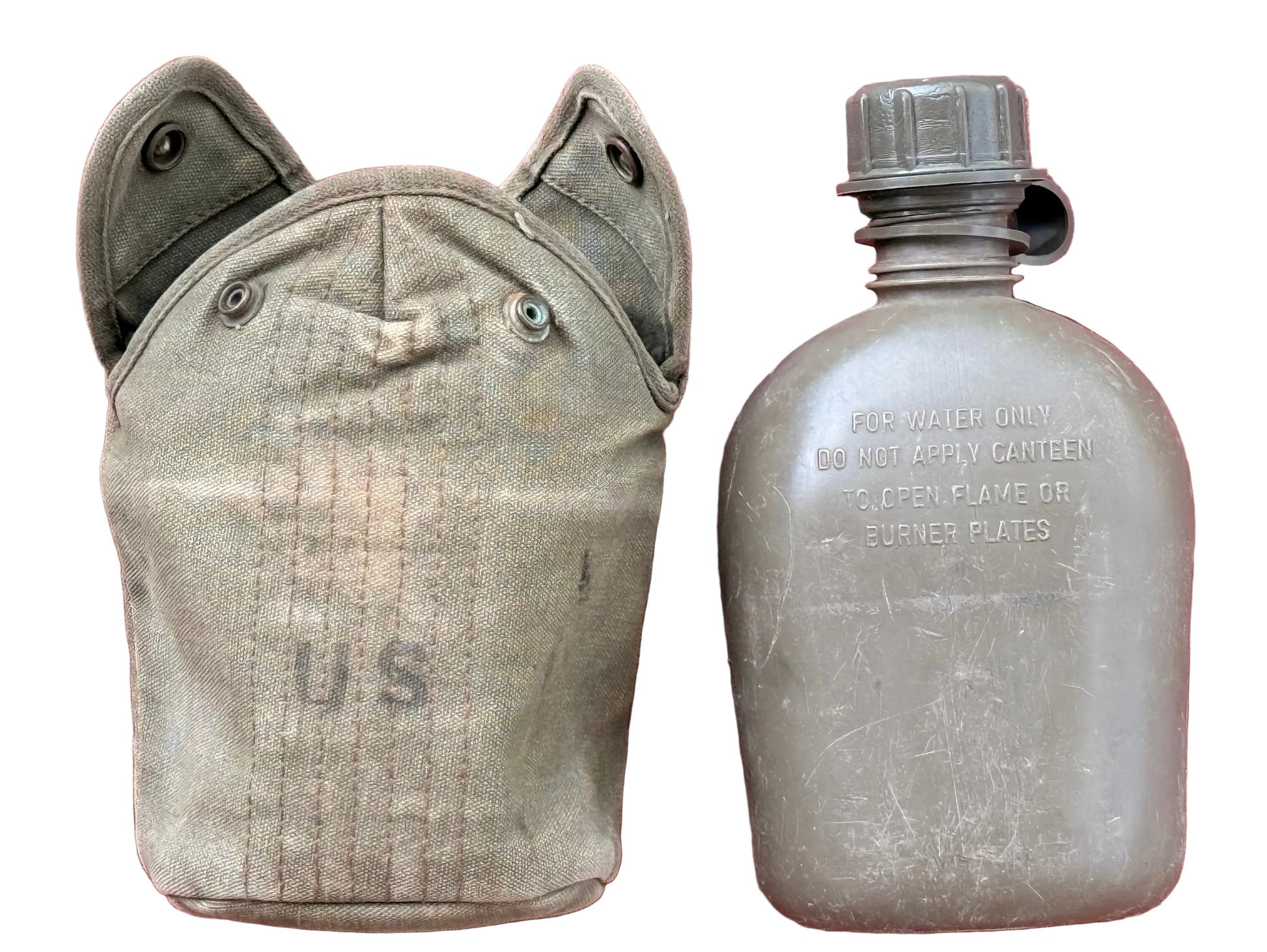 A vintage military canteen bottle next to its canvas cover, both in olive drab green, displayed against a textured pinkish-red background.
