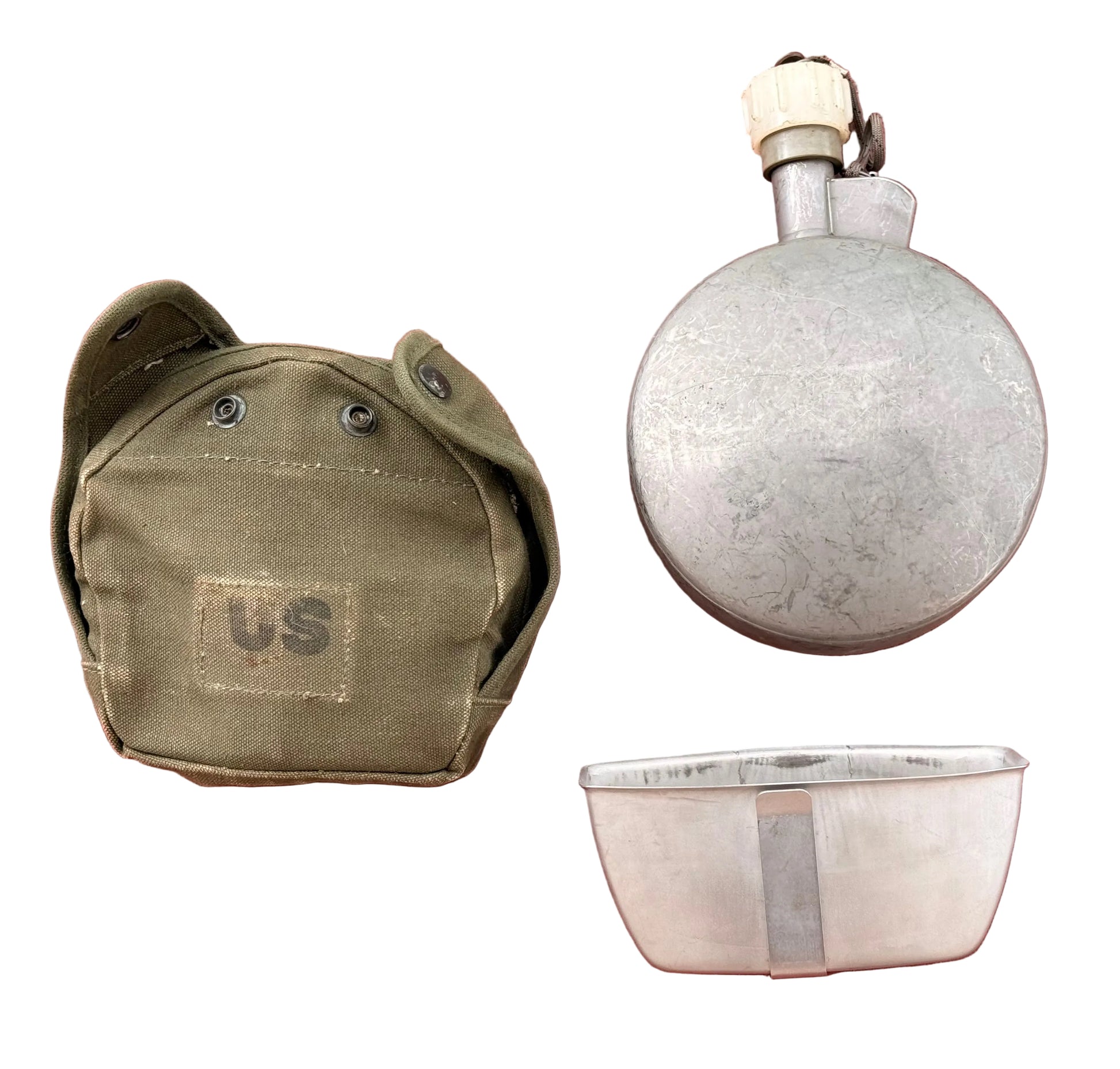A vintage military canteen set on a textured red background, featuring an olive drab canvas carrying pouch with a 'US' patch, a round silver metal flask, and a small silver metal cup.