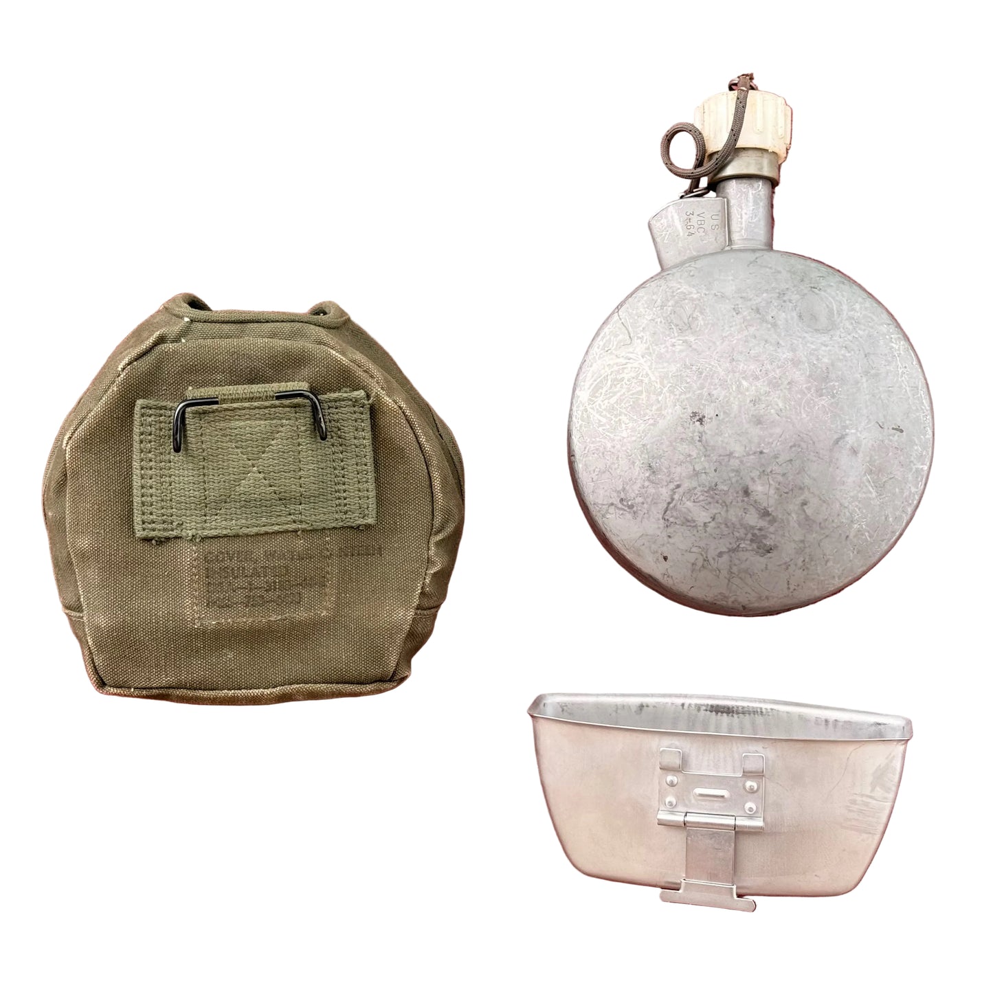A vintage military-style metal flask with a cream-colored cork stopper and a matching olive drab green fabric pouch, displayed on a textured red background.