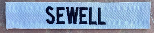 Vintage US Army Name Tape Black on White "Sewell" - Bateleur Militaria