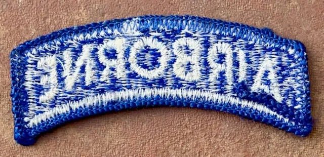 US Army Airborne Tab White on Blue Merrowed Edge - Bateleur Militaria
